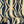 Deco Prism wallpaper by Liberty James Studio in navy and gold, roll showing art deco wave stripes
