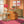Deco Prism wallpaper by Liberty James Studio in orange, art deco wave stripes in a home office