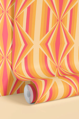 Deco Prism wallpaper by Liberty James Studio in orange, partly unrolled roll showing art deco wave stripes
