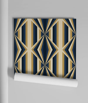 Deco Prism wallpaper by Liberty James Studio in navy and gold, partly unrolled roll showing art deco wave stripes