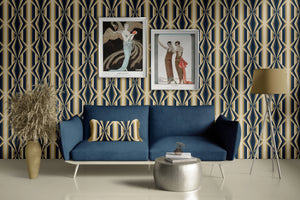 Deco Prism wallpaper by Liberty James Studio in navy and gold, art deco wave stripes behind a sofa in a living room