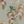 Aviary Isle wallpaper by Deus ex Gardenia in pale blue, flat sample of birds among island flowers