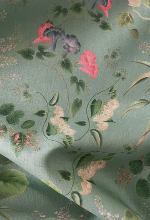 Little Eden linen by Deus ex Gardenia in sage green, in soft folds showing lush leaves and fruit