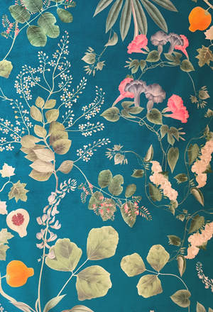 Little Eden velvet by Deus ex Gardenia in teal, draped, showing lush leaves and fruit
