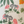 Little Eden velvet by Deus ex Gardenia in cream and green, draped, showing lush leaves and fruit