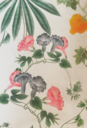 Little Eden velvet by Deus ex Gardenia in cream and green, draped, showing lush leaves and fruit