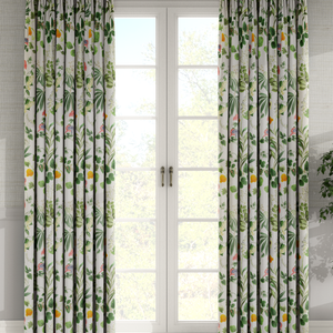 Little Eden linen by Deus ex Gardenia in cream and green, lush leaves and fruit made into curtains