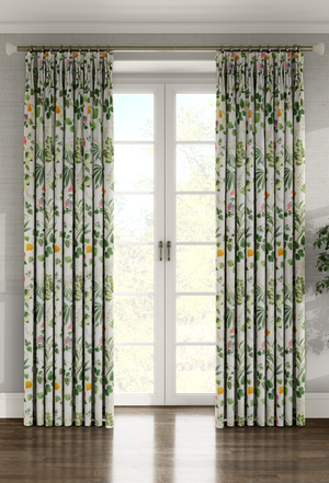 Little Eden linen by Deus ex Gardenia in cream and green, lush leaves and fruit made into curtains