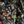 Little Eden velvet by Deus ex Gardenia in black, draped close-up of lush leaves and fruit