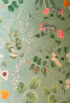 Little Eden velvet by Deus ex Gardenia in sage green, draped close-up of lush leaves and fruit
