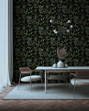 Little Eden wallpaper by Deus ex Gardenia in black, lush leaves and fruit in a dining area