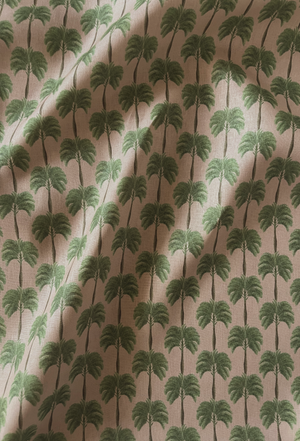 Little Palma linen by Deus ex Gardenia in pink and green, draped, showing rows of palm trees