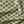 Little Palma linen by Deus ex Gardenia in beige and green, in soft folds showing rows of palm trees
