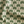 Little Palma linen by Deus ex Gardenia in beige and green, draped, showing rows of palm trees