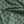 Little Palma velvet by Deus ex Gardenia in sage green, draped, showing rows of palm trees