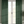 Little Palma linen by Deus ex Gardenia in sage green, rows of palm trees made into curtains