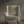 Little Palma velvet by Deus ex Gardenia in sage green, rows of palm trees upholstered on an armchair