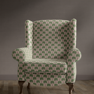Little Palma velvet by Deus ex Gardenia in sage green, rows of palm trees upholstered on an armchair