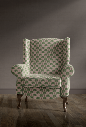 Little Palma velvet by Deus ex Gardenia in sage green, rows of palm trees upholstered on an armchair