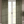 Little Palma linen by Deus ex Gardenia in beige and green, rows of palm trees as lined curtains