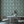 Midsummer wallpaper by Deus ex Gardenia in cream and blue, trailing bellflowers in a dining area
