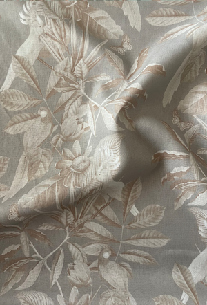 Passiflora linen by Deus ex Gardenia in grey, draped, showing parrots and passion flowers