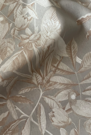 Passiflora linen by Deus ex Gardenia in grey, in soft folds showing parrots and passion flowers
