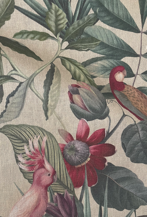 Passiflora linen by Deus ex Gardenia in cream, in soft folds showing parrots and passion flowers