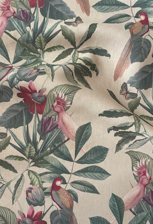 Passiflora linen by Deus ex Gardenia in cream, draped, showing parrots and passion flowers