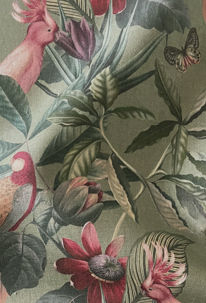 Passiflora linen by Deus ex Gardenia in sage green, draped close-up of parrots and passion flowers