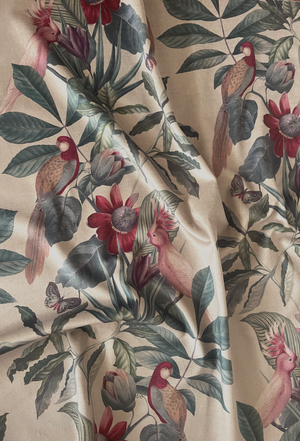 Passiflora velvet by Deus ex Gardenia in cream, draped close-up of parrots and passion flowers