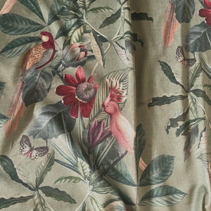 Passiflora velvet by Deus ex Gardenia in sage green, draped, showing parrots and passion flowers