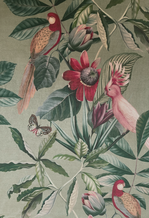 Passiflora velvet by Deus ex Gardenia in sage green, in soft folds showing parrots and passion flowers