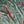 Passiflora velvet by Deus ex Gardenia in teal, in soft folds showing parrots and passion flowers