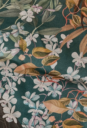 Resplendent Woods linen by Deus ex Gardenia in dark green, in soft folds showing peacocks and pheasants in trees