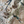 Resplendent Woods linen by Deus ex Gardenia in cream, draped close-up of peacocks and pheasants in trees