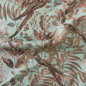 Resplendent Woods linen by Deus ex Gardenia in teal, draped, showing peacocks and pheasants in trees