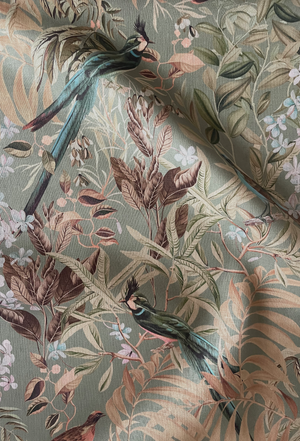 Resplendent Woods linen by Deus ex Gardenia in sage green, draped close-up of peacocks and pheasants in trees