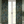 Resplendent Woods linen by Deus ex Gardenia in dark green, peacocks and pheasants in trees made into curtains