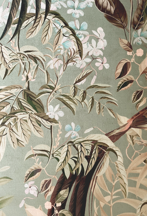 Resplendent Woods velvet by Deus ex Gardenia in sage green, in soft folds showing peacocks and pheasants in trees