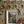 Resplendent Woods superwide wallpaper by Deus ex Gardenia in dark green, peacocks and pheasants in trees in a kitchen