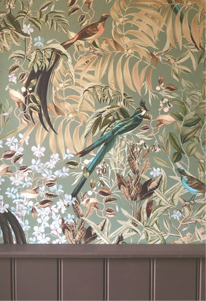 Resplendent Woods wallpaper by Deus ex Gardenia in sage green, pattern sample of peacocks and pheasants in trees
