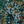 Resplendent Woods wallpaper by Deus ex Gardenia in dark green, flat sample of peacocks and pheasants in trees