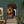 Little Palma vinyl wallpaper by Deus ex Gardenia in teal, rows of palm trees in an entryway