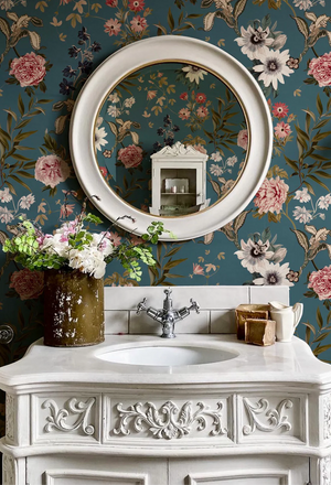 Beechcroft Garden wallpaper by Deus ex Gardenia in teal, garden flowers and foliage in a bathroom