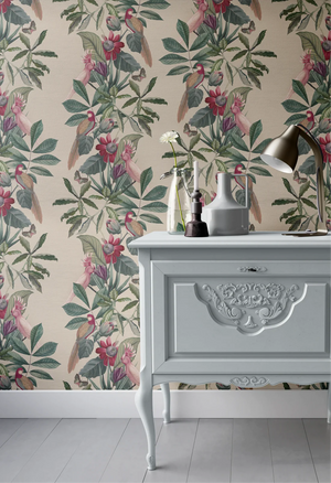 Passiflora wallpaper by Deus ex Gardenia in cream, parrots and passion flowers above a sideboard