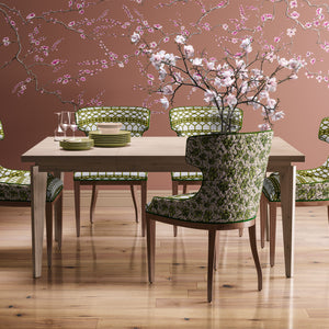 Blossom wallpaper by Dami and Em Design in pink, blossom branches in a dining area