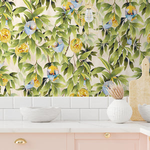 Disco Lemons wallpaper by Brand McKenzie in yellow and green, lemon branches with disco balls behind bar stools