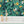 Disco Lemons wallpaper by Brand McKenzie in teal, lemon branches with disco balls in a kitchen