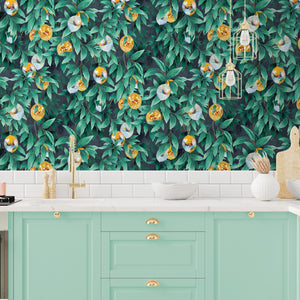 Disco Lemons wallpaper by Brand McKenzie in teal, lemon branches with disco balls above kitchen cabinets
